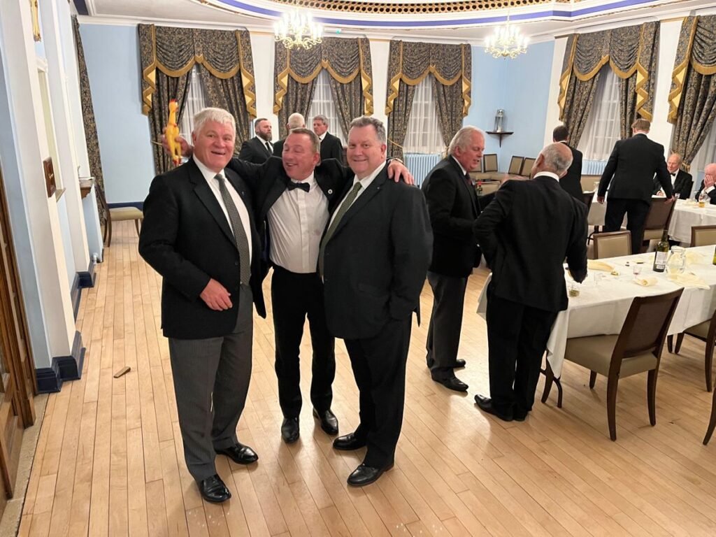 Members of the organization networking to build wealth within the illuminati marvel tradition.